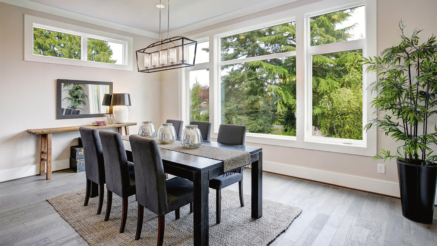 dining room with large fixed windows