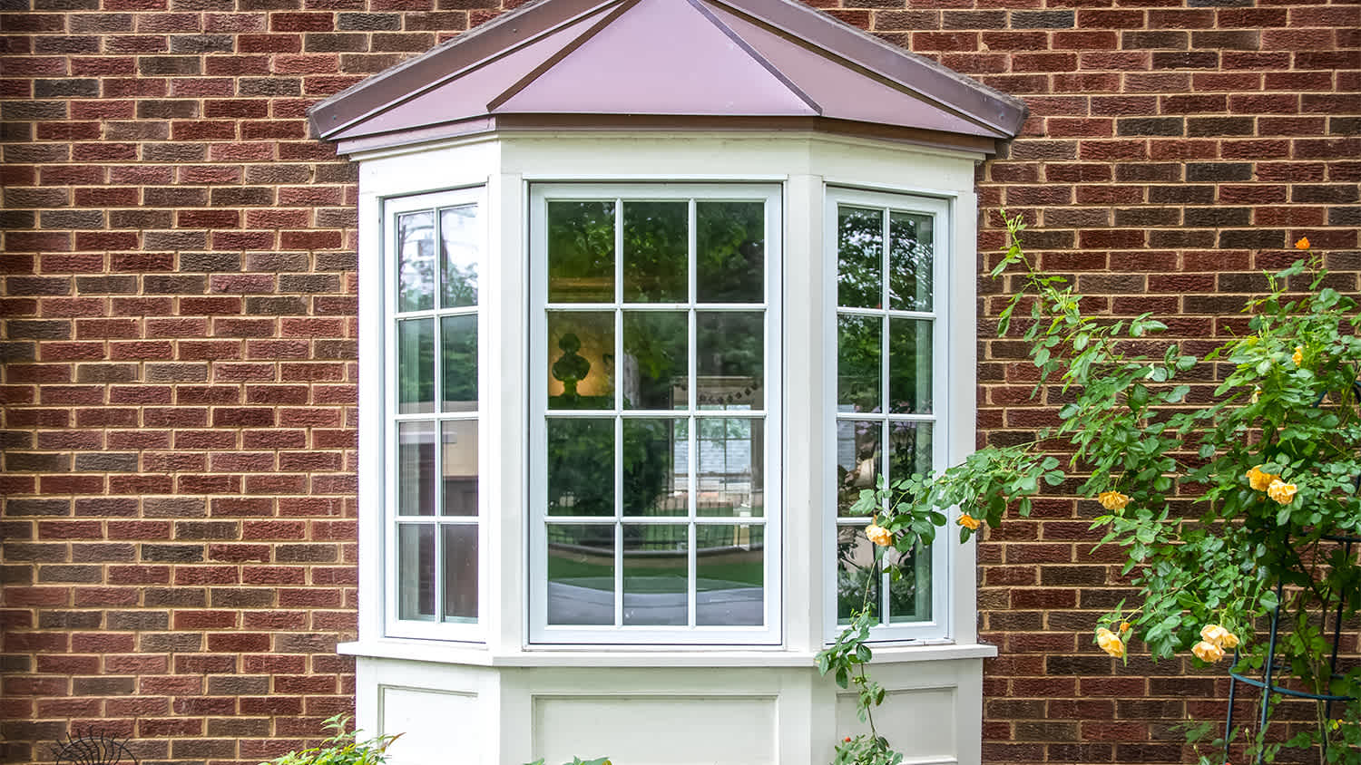 exterior brick house with bay windows