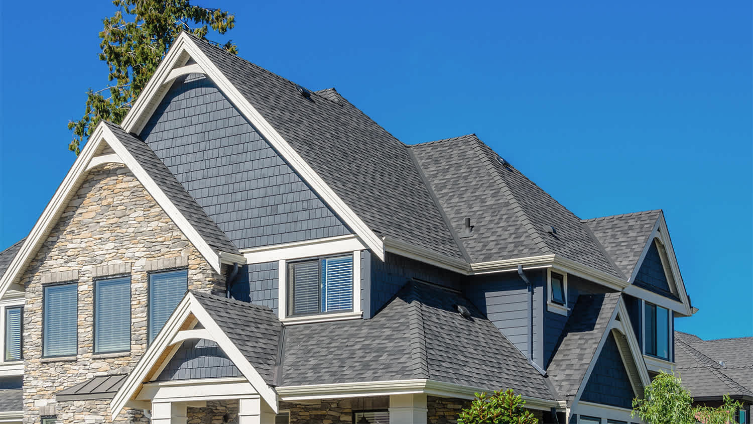 beige house gray roof