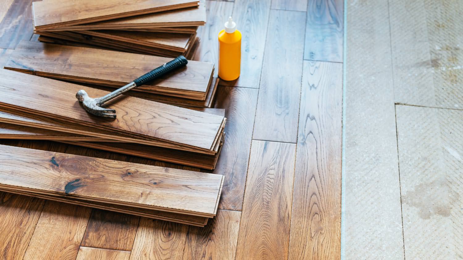 A pile of handscraped hardwood waiting to be installed