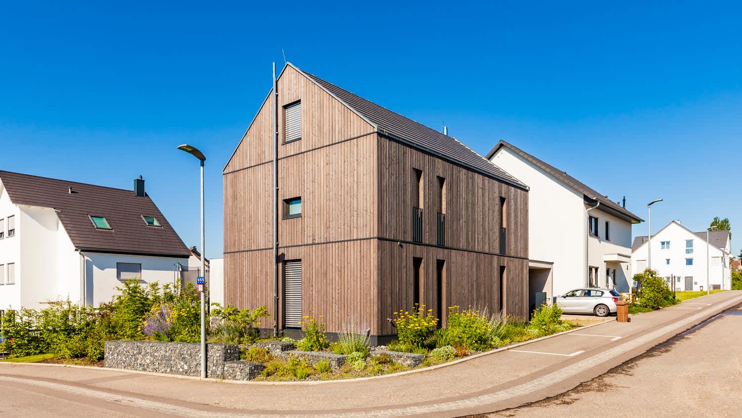 The exterior of a modern house made of sustainable wood