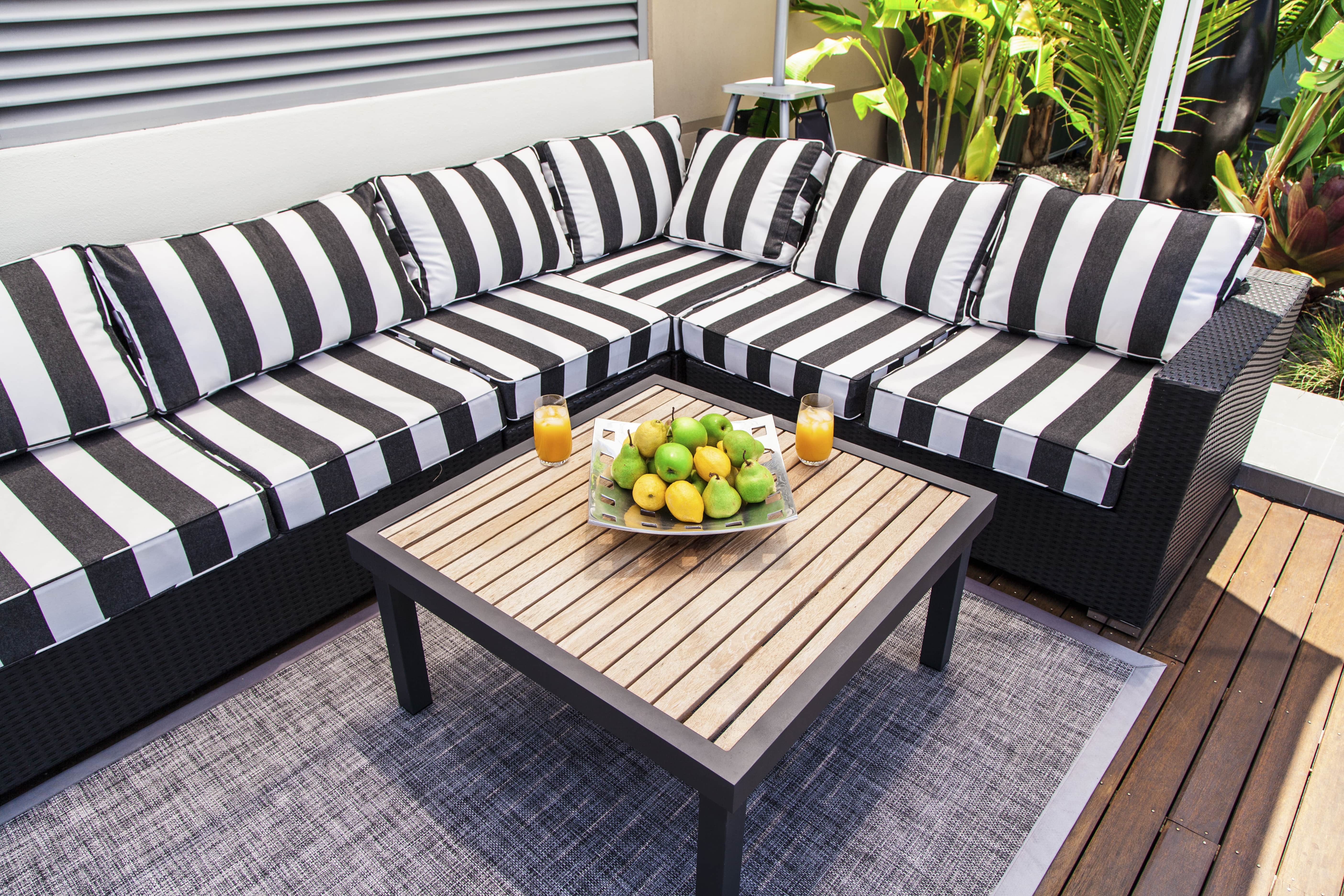 Outdoor couch with striped cushions