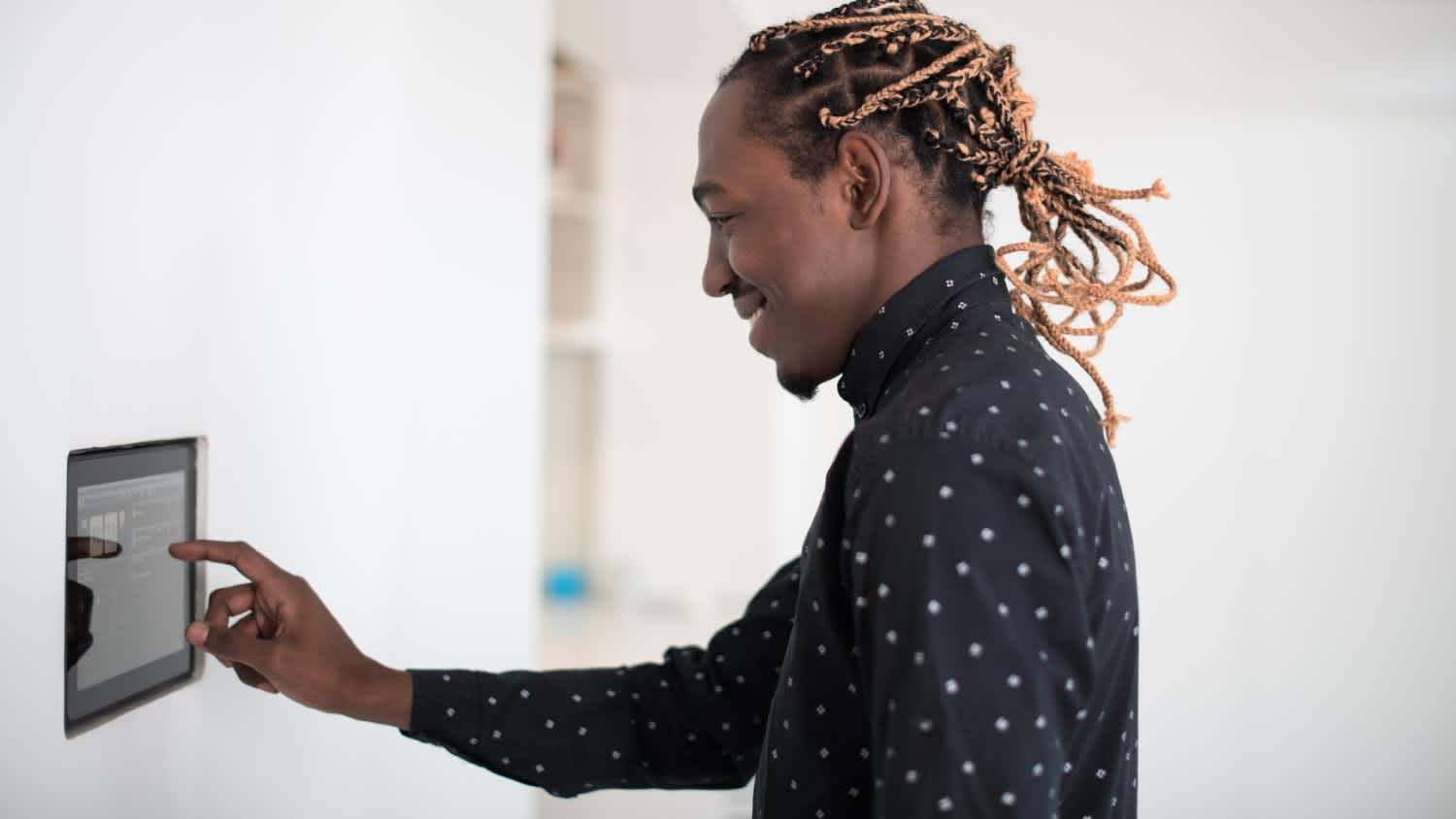 Man using smart home screen