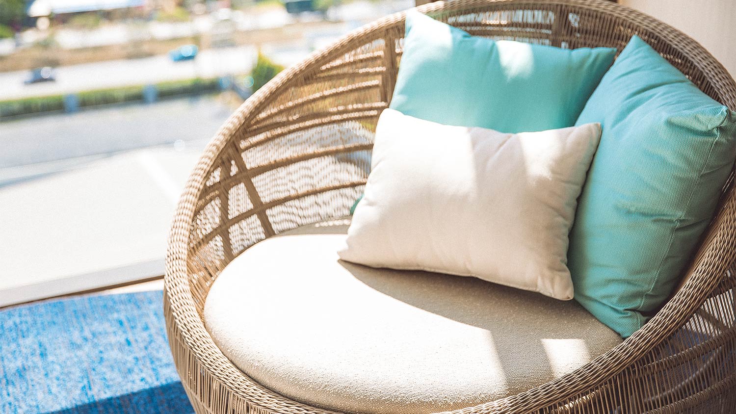 Teal and white patio pillows
