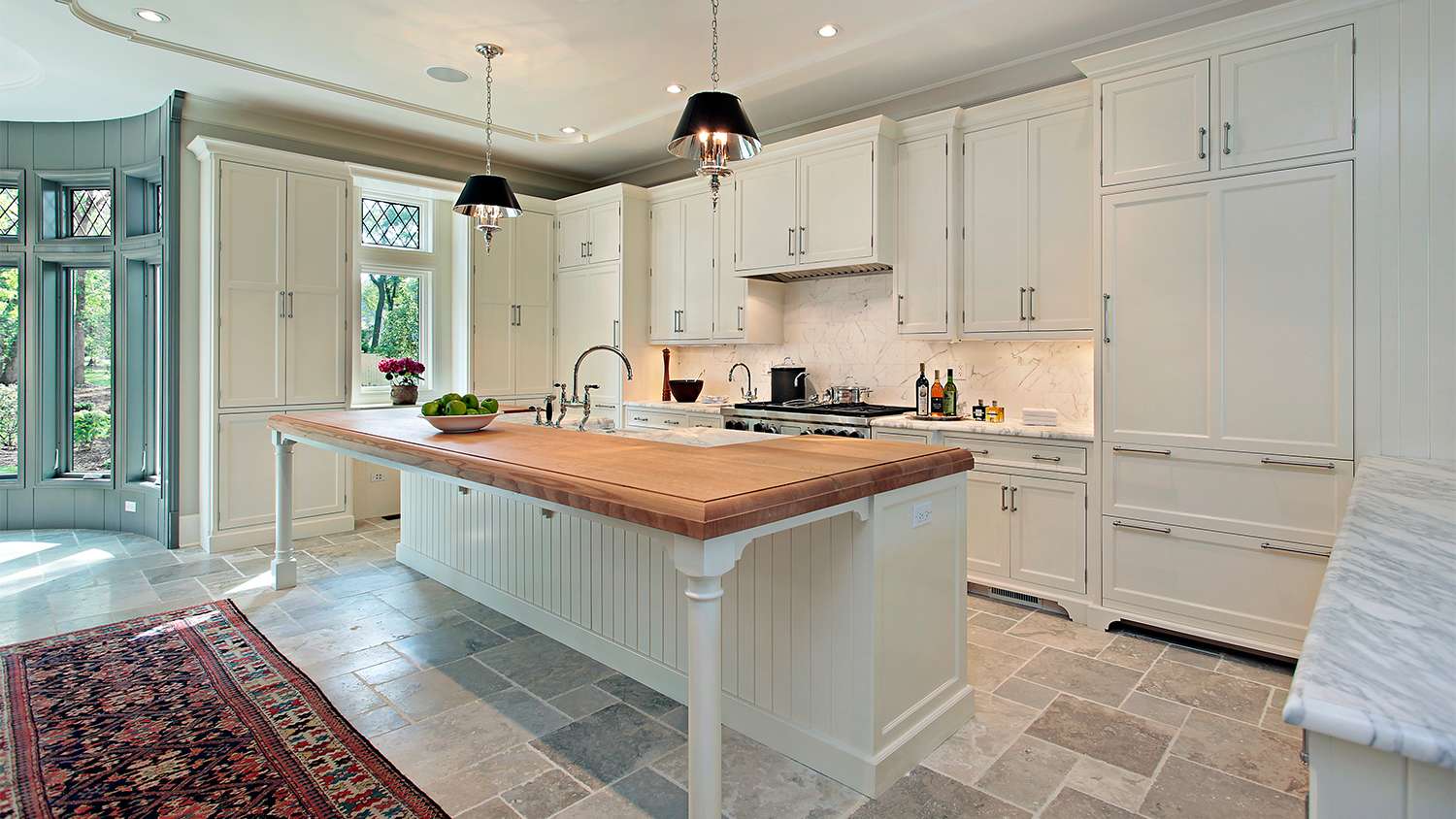 white kitchen with grey tiled floor