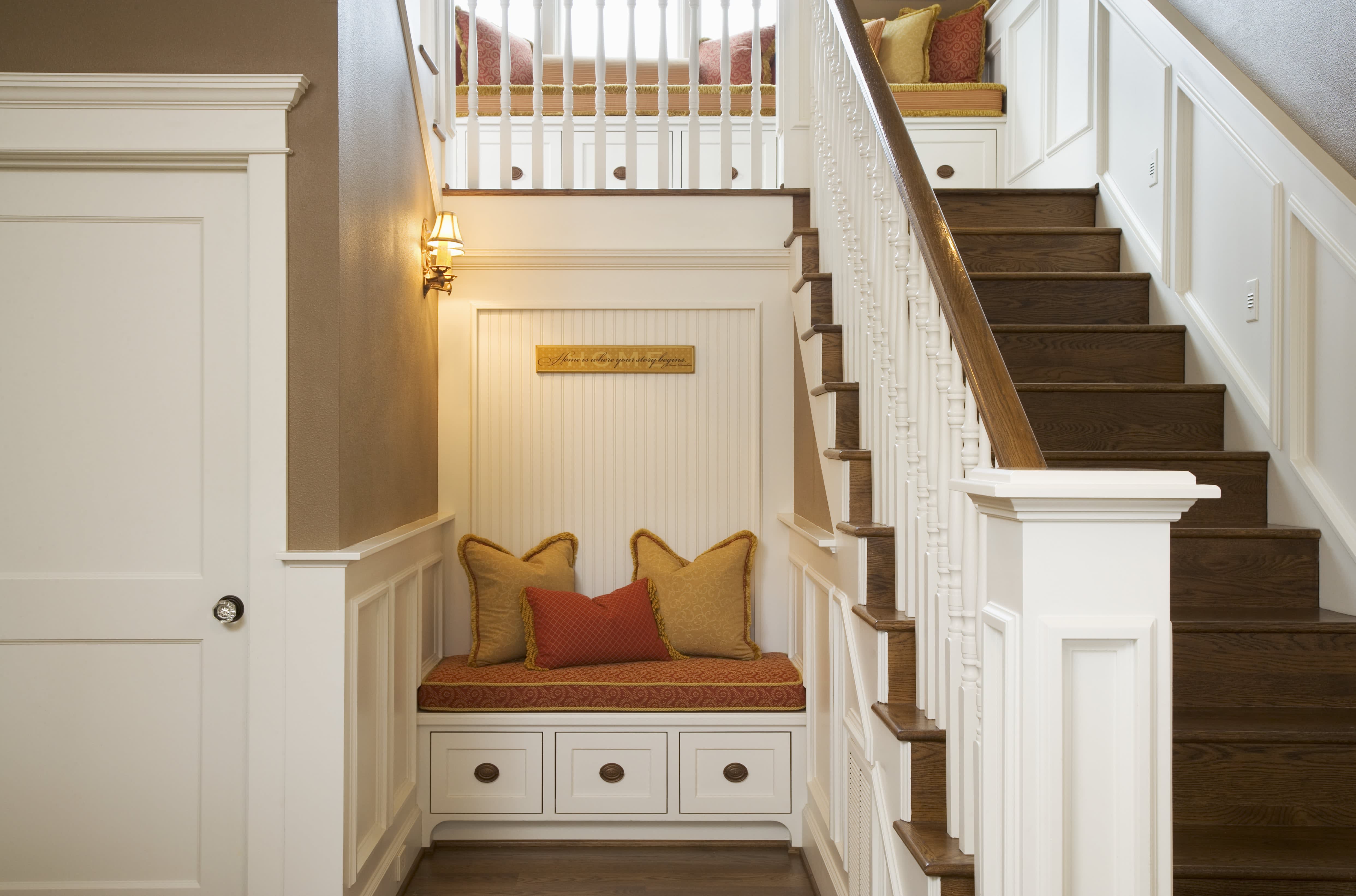 An interior staircase with a built-in seating area