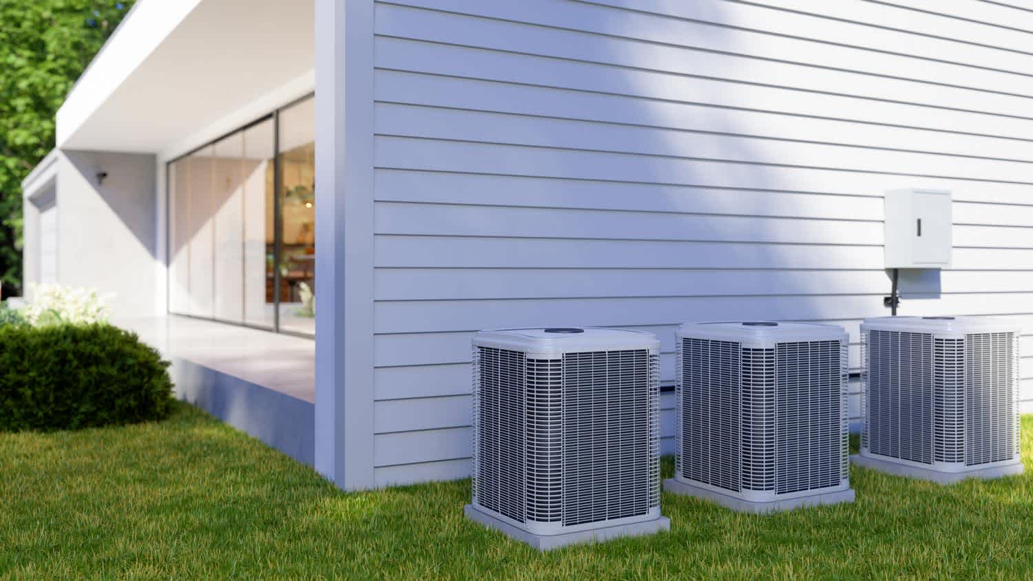 The exterior of a villa with an HVAC system