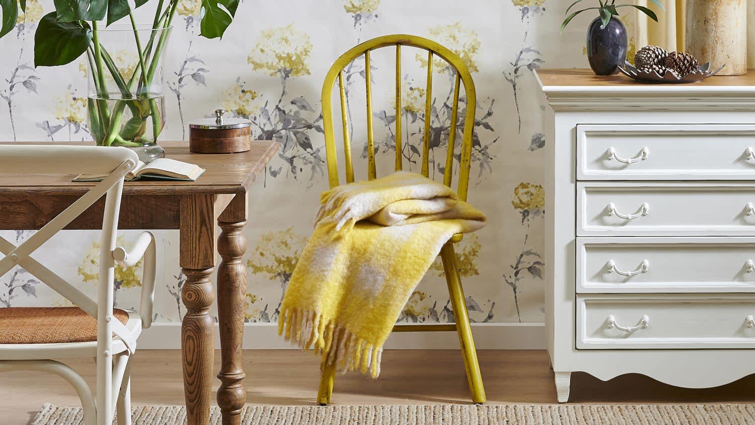 Wooden furniture with a flower wallpaper