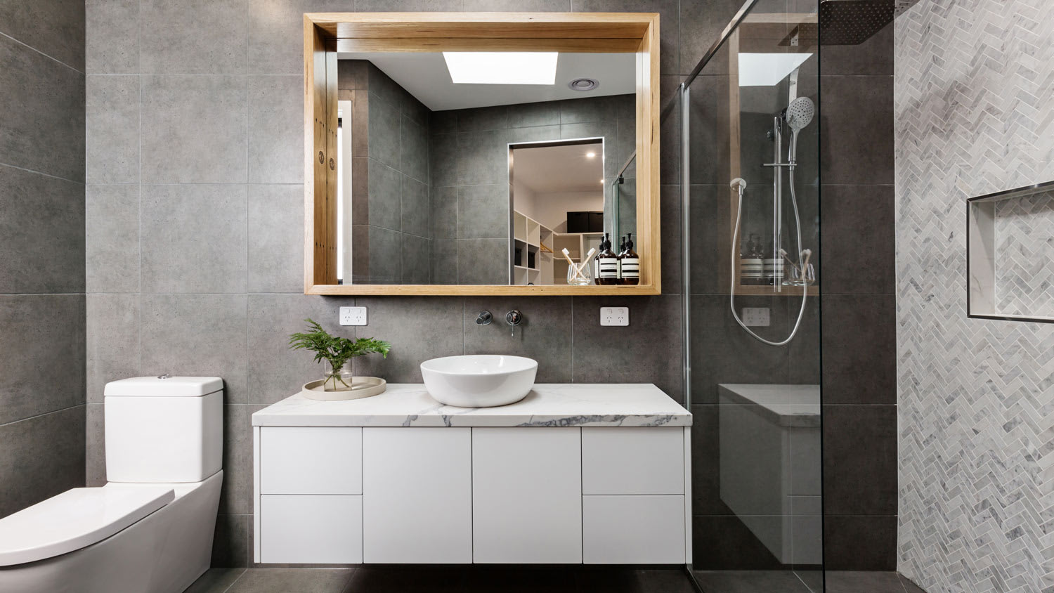 A modern bathroom with a floating vanity