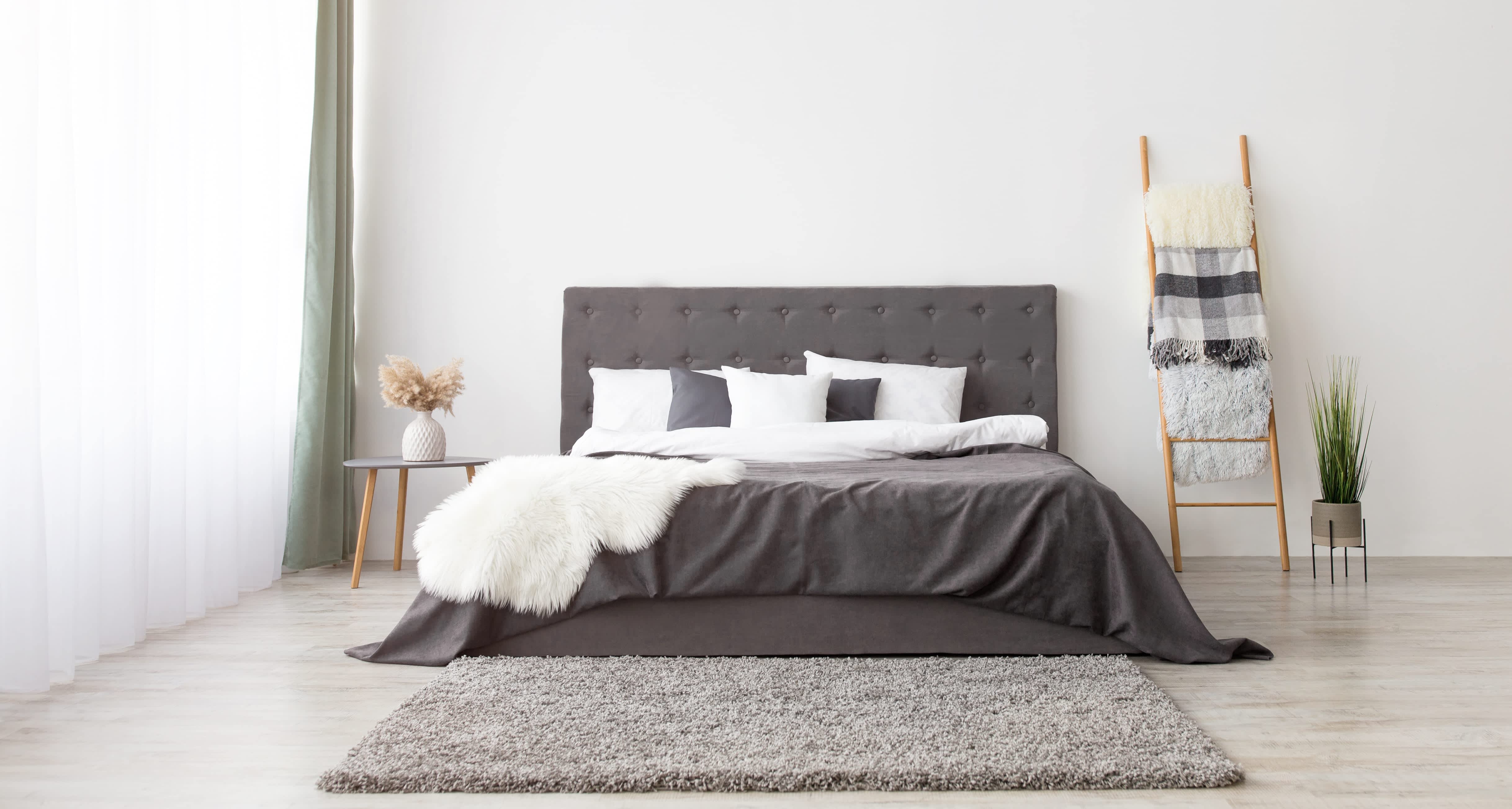 gray and white bedroom with simple décor