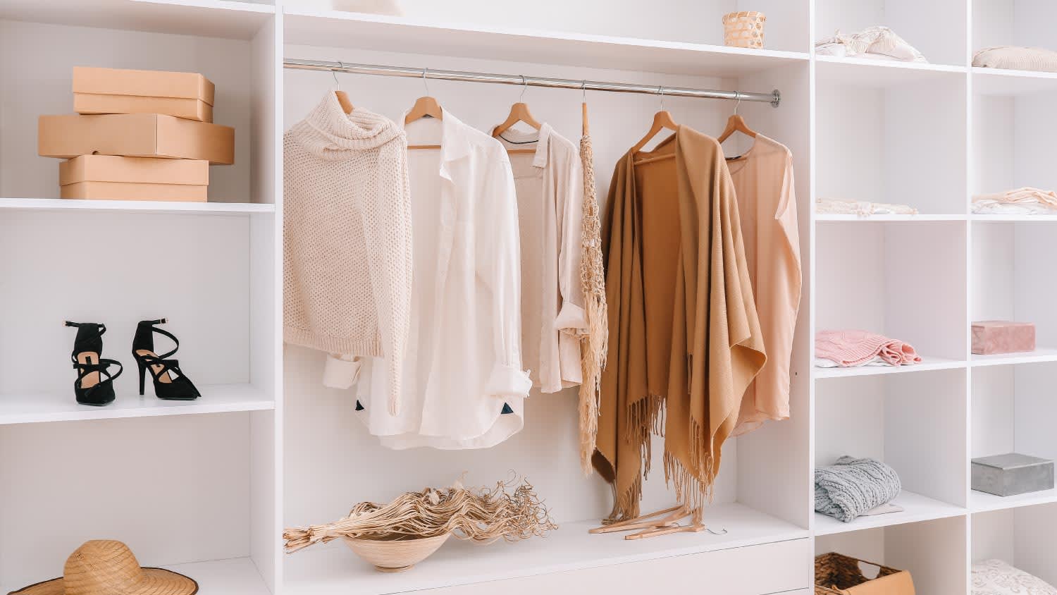 Wardrobe with stylish female clothes