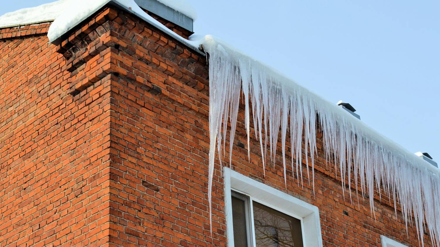 red brick home grey roof