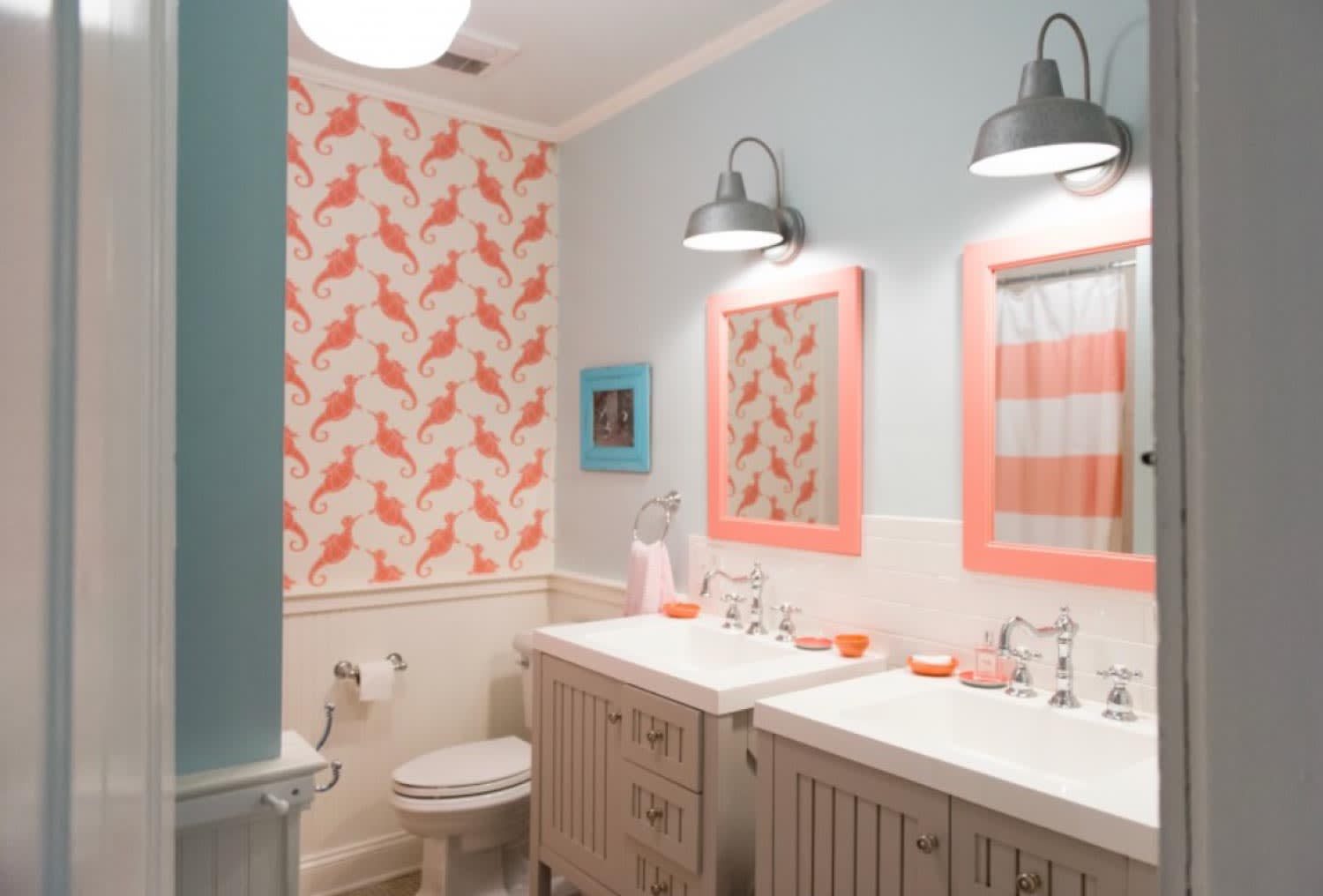 A bathroom with double vanities