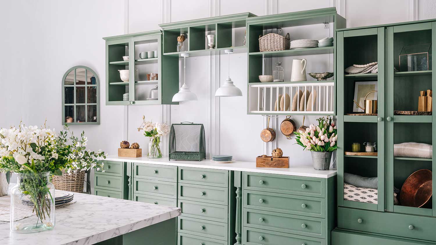 White kitchen with green cabinets