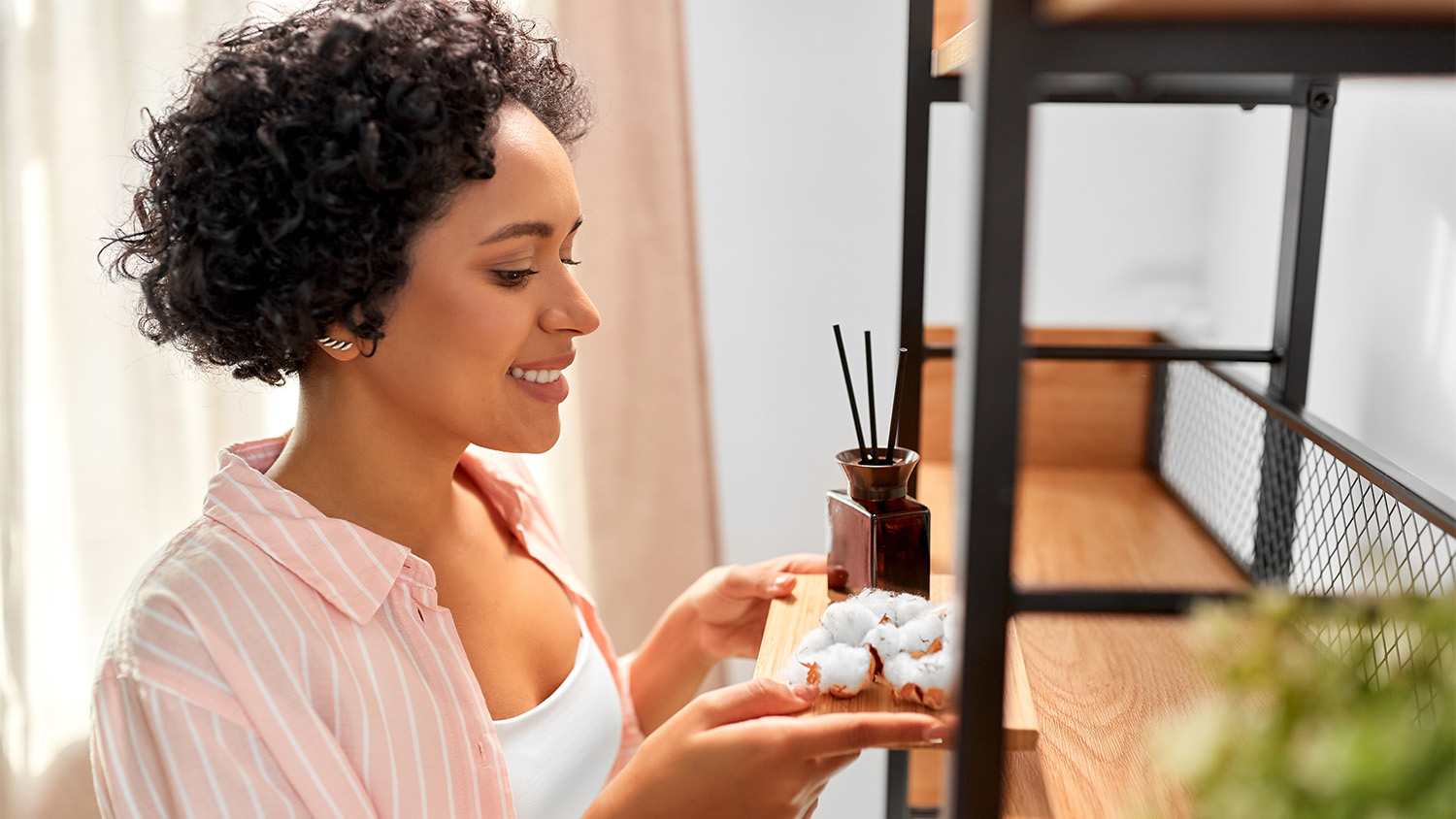 woman holding aromatherapy tray