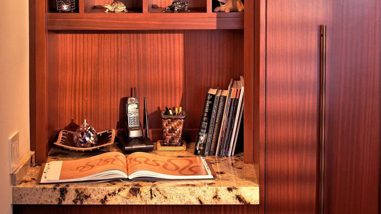 Warm light wooden cabinet and marble desk