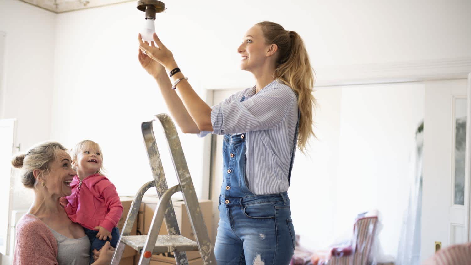 A family changing light fixture