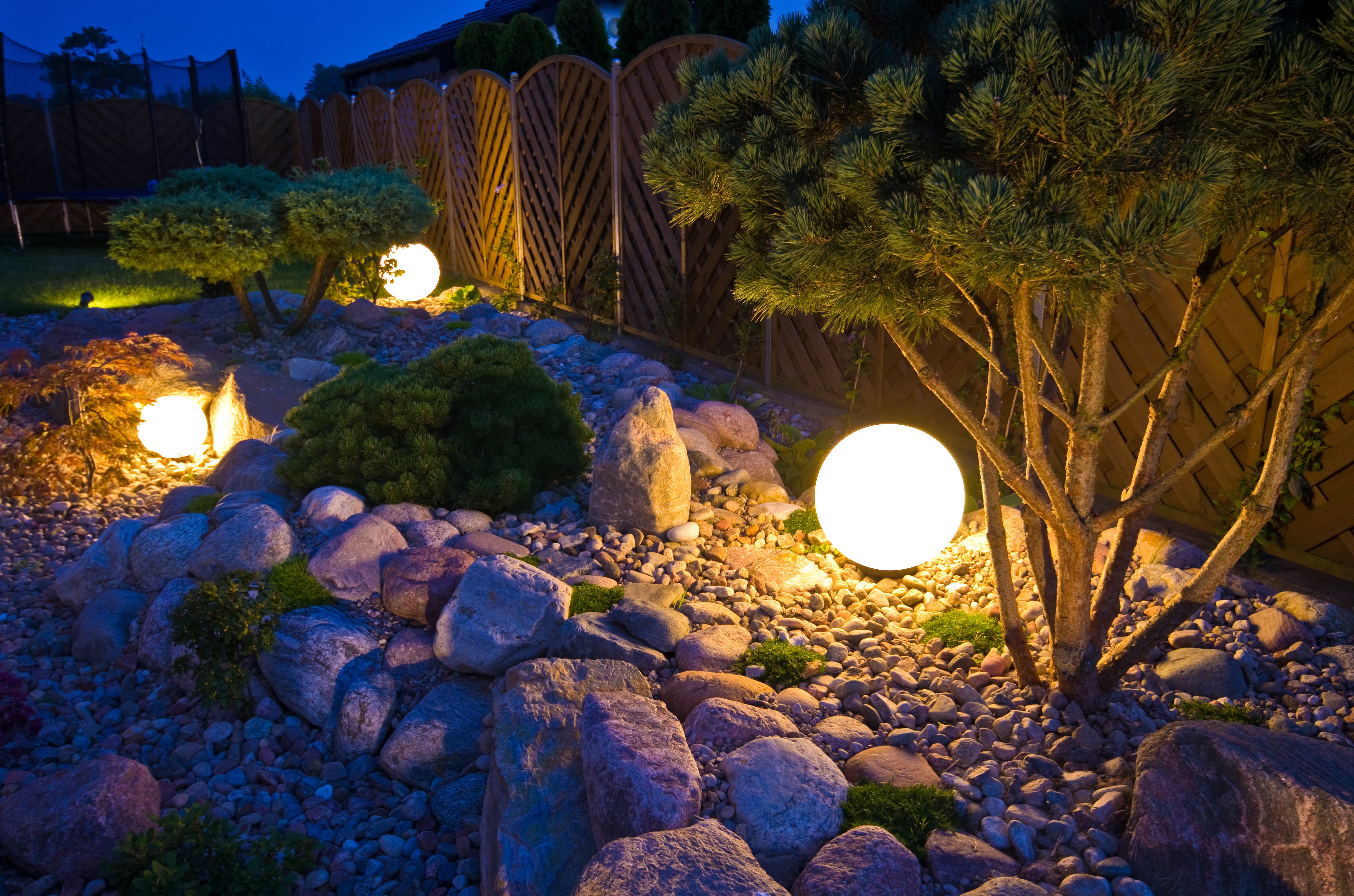 Globe lanterns in a rock garden