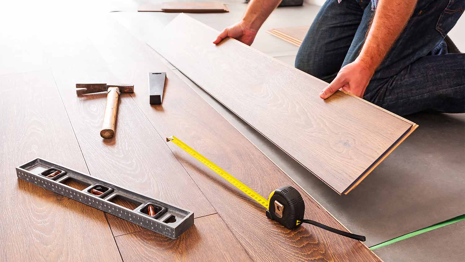 installing new laminated wooden floor