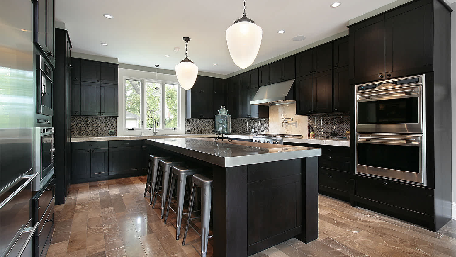 Kitchen with dark wood cabinetry