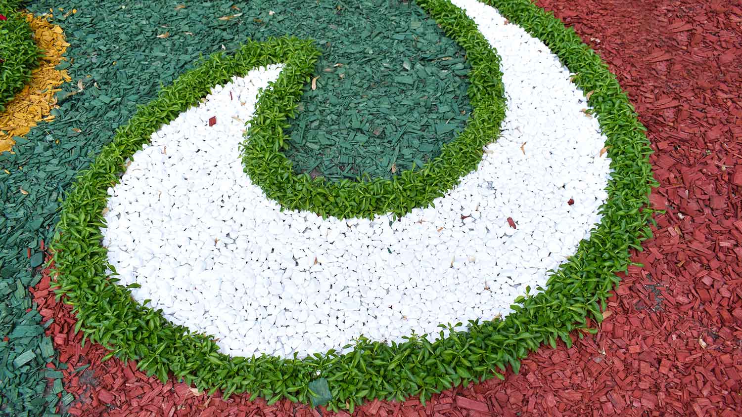 Garden design with colored mulch