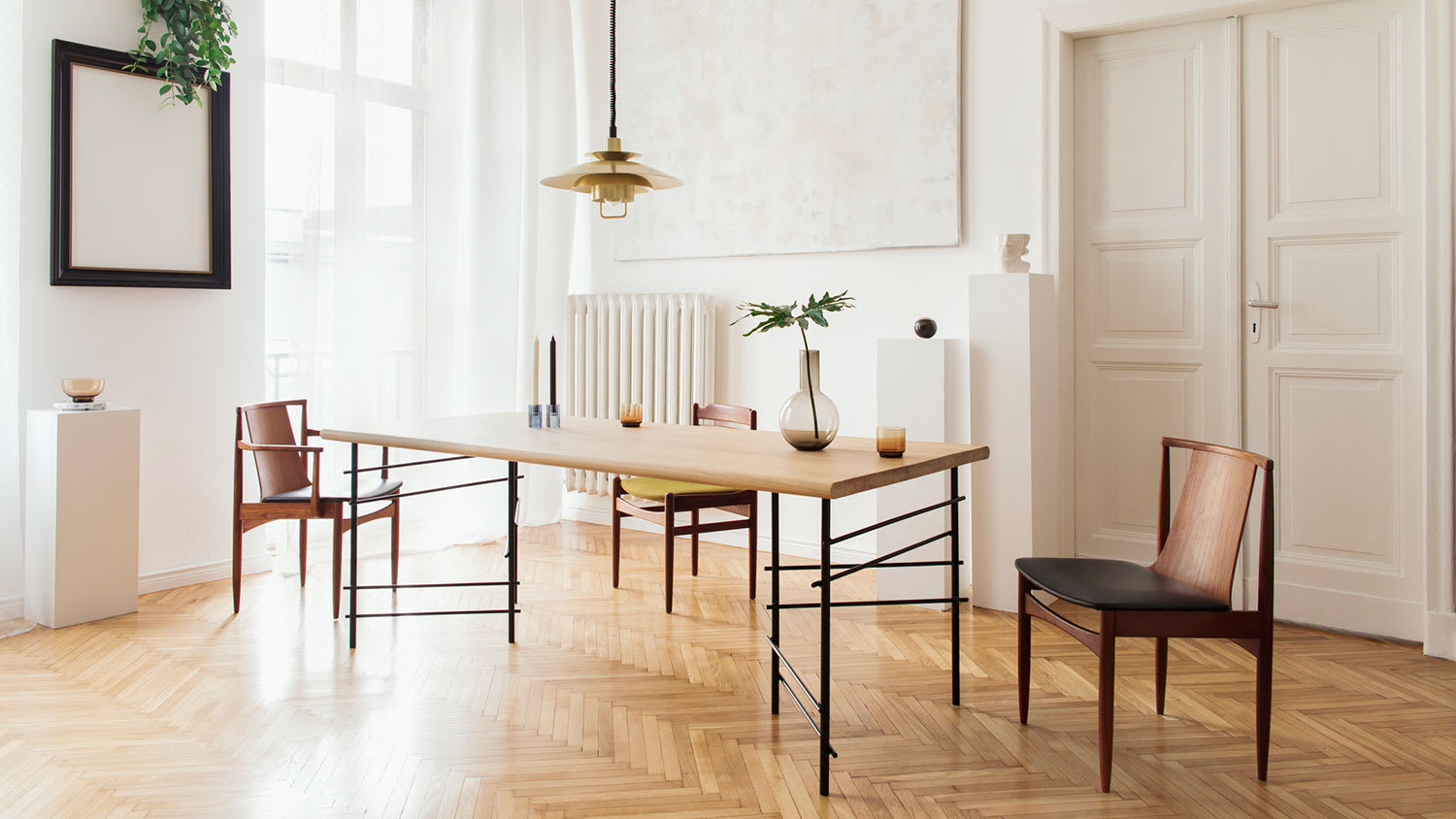 Stylish dining room interior with hardwood flooring