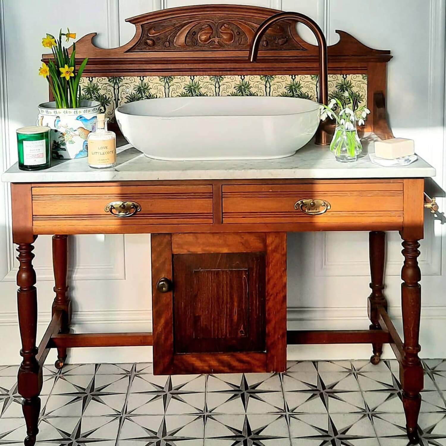A bathroom sink created from a vintage desk