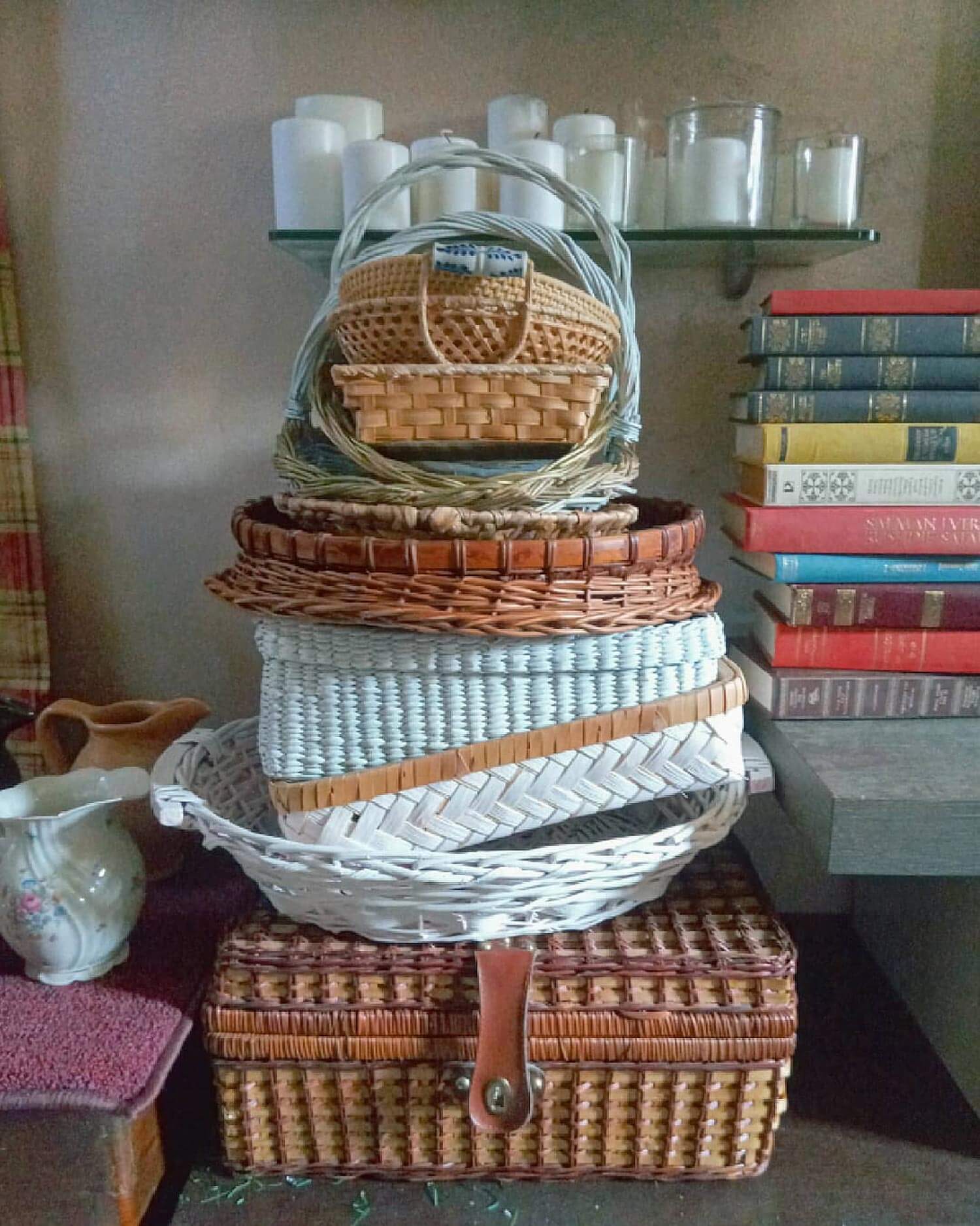 Layed wicker baskets next to vintage book