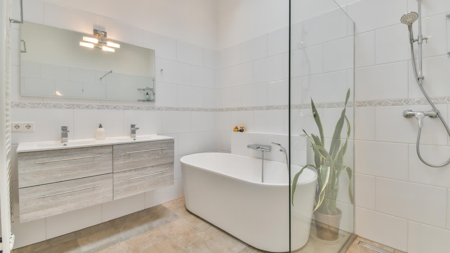 A spacious bathroom with bathtub and shower