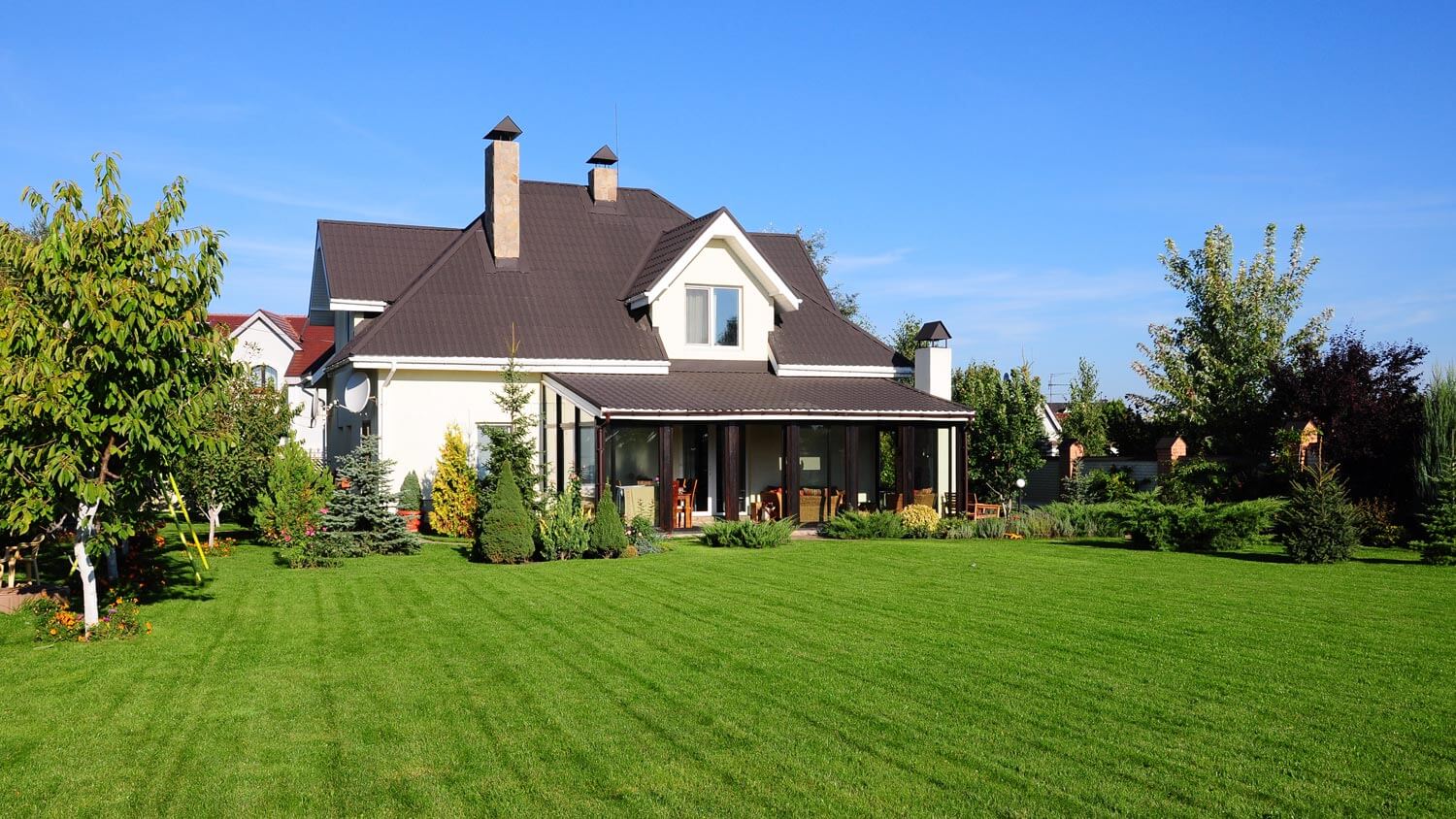A two-story house with a big backyard