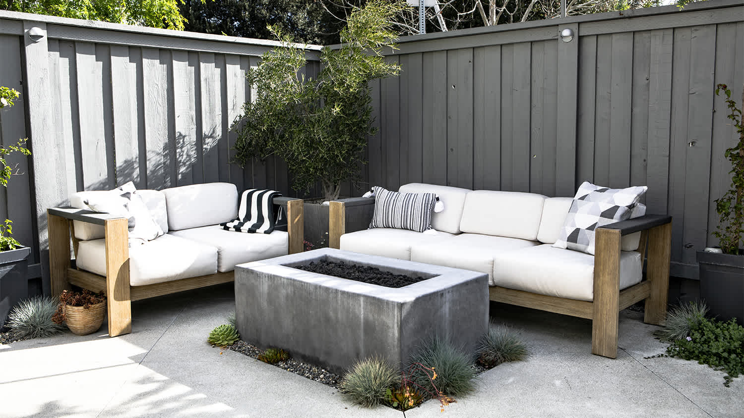 patio furniture against fence