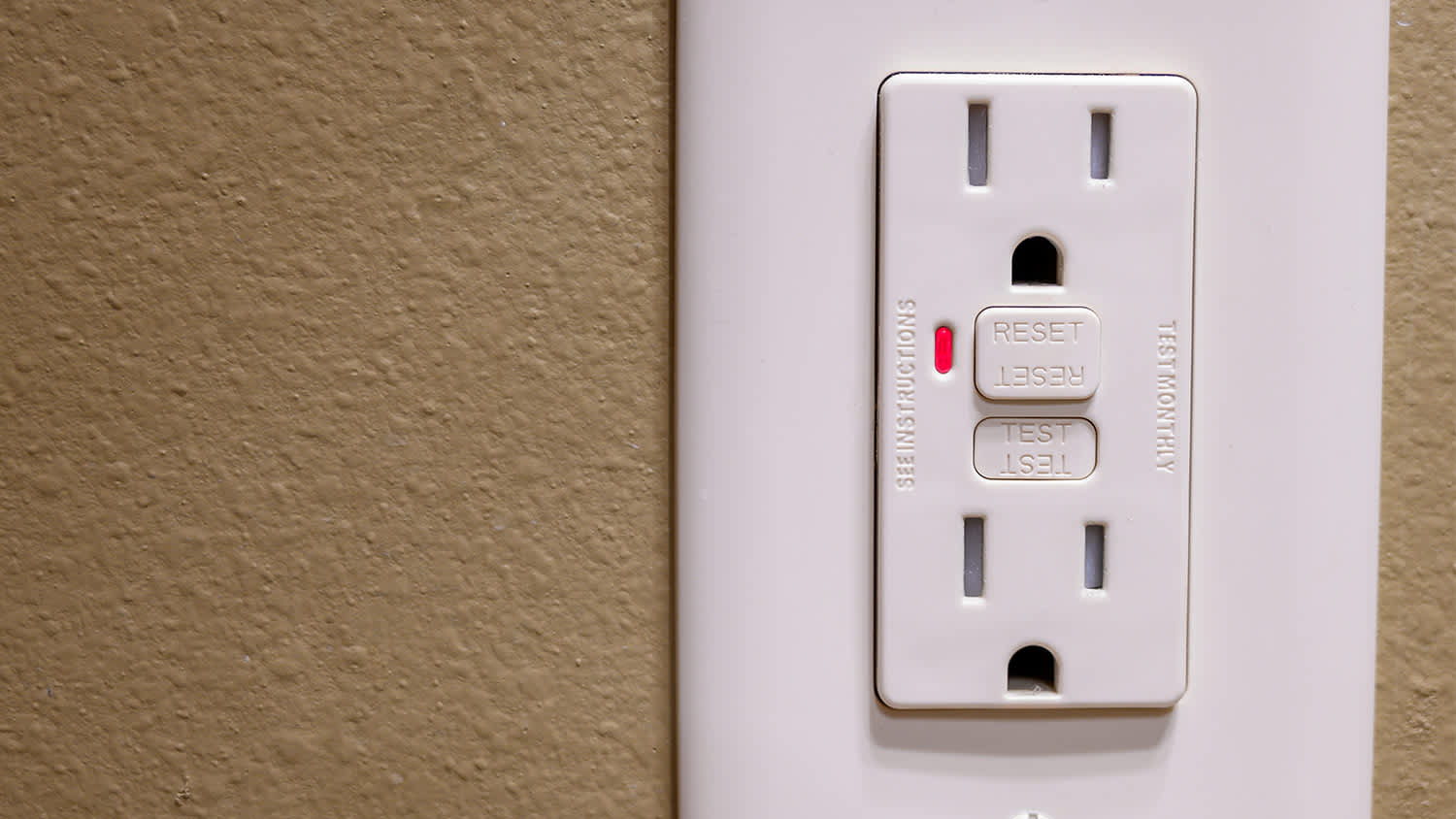White outlet reset test brown wall