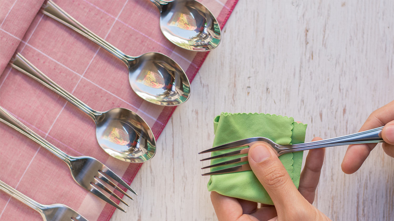 Polish silverware green cloth