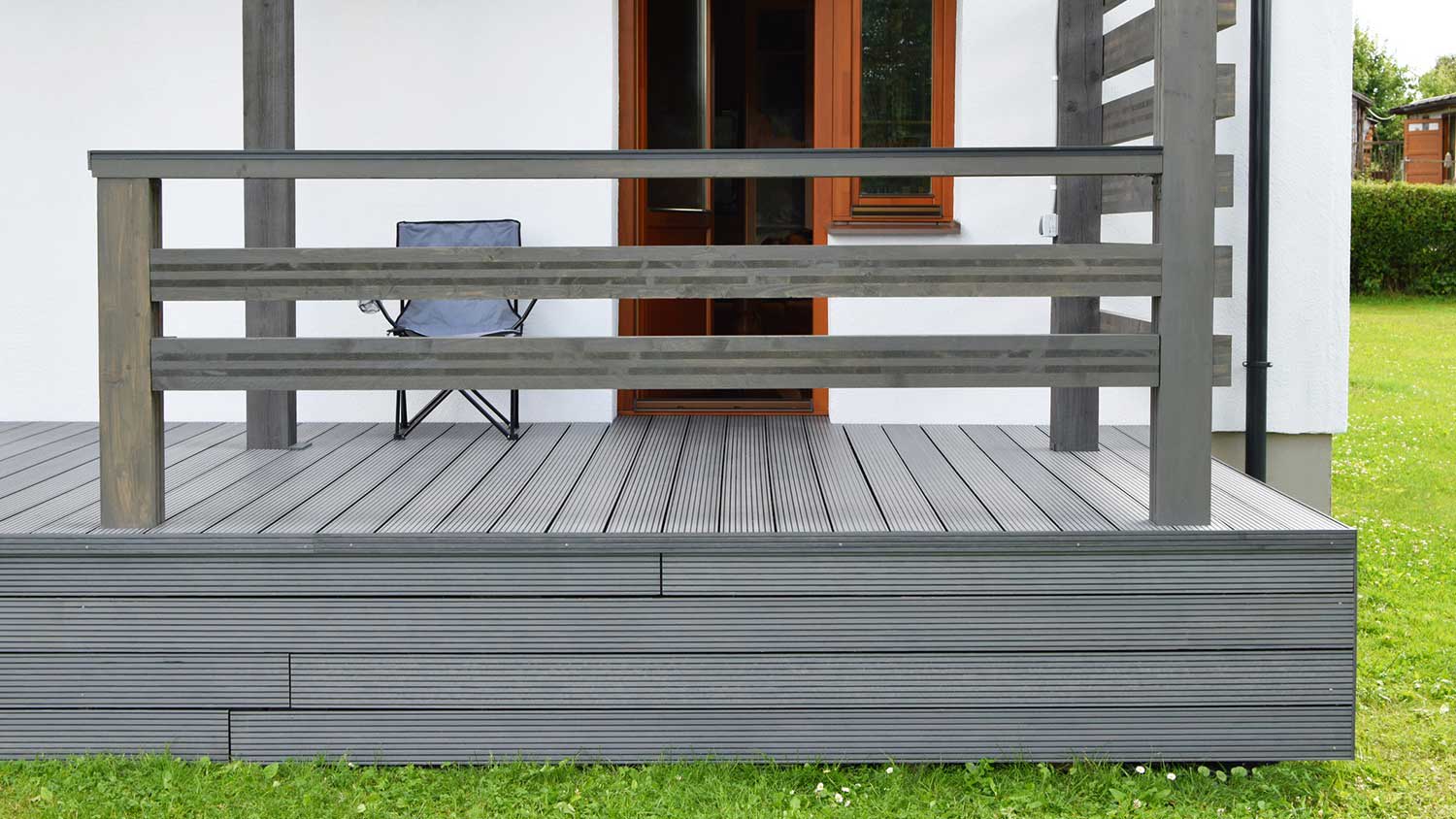 House with gray composite deck