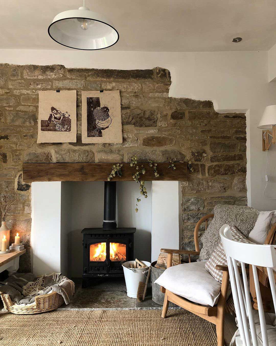 Stone wall and plaster fireplace surround