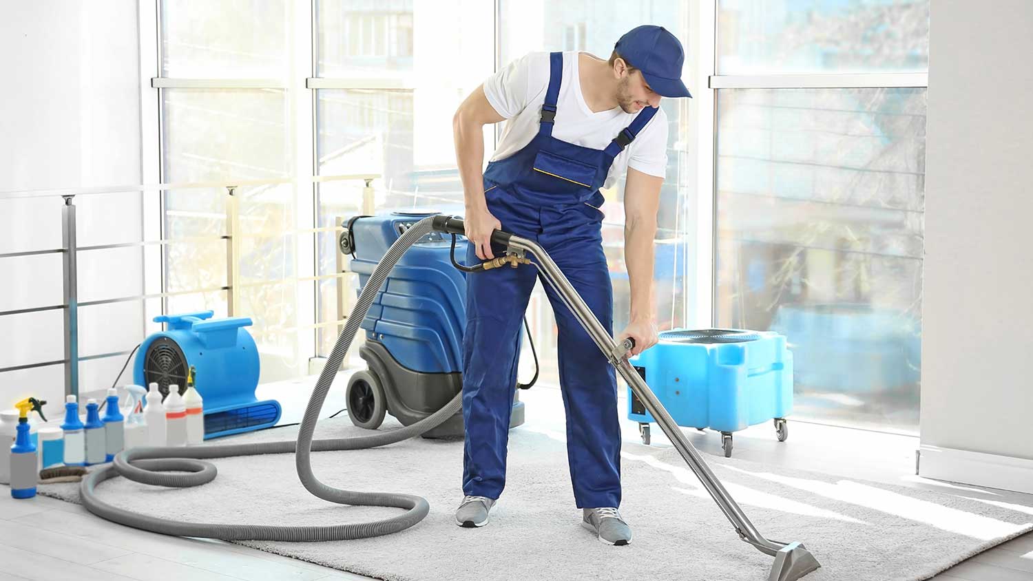 Professional carpet cleaner in someone’s home