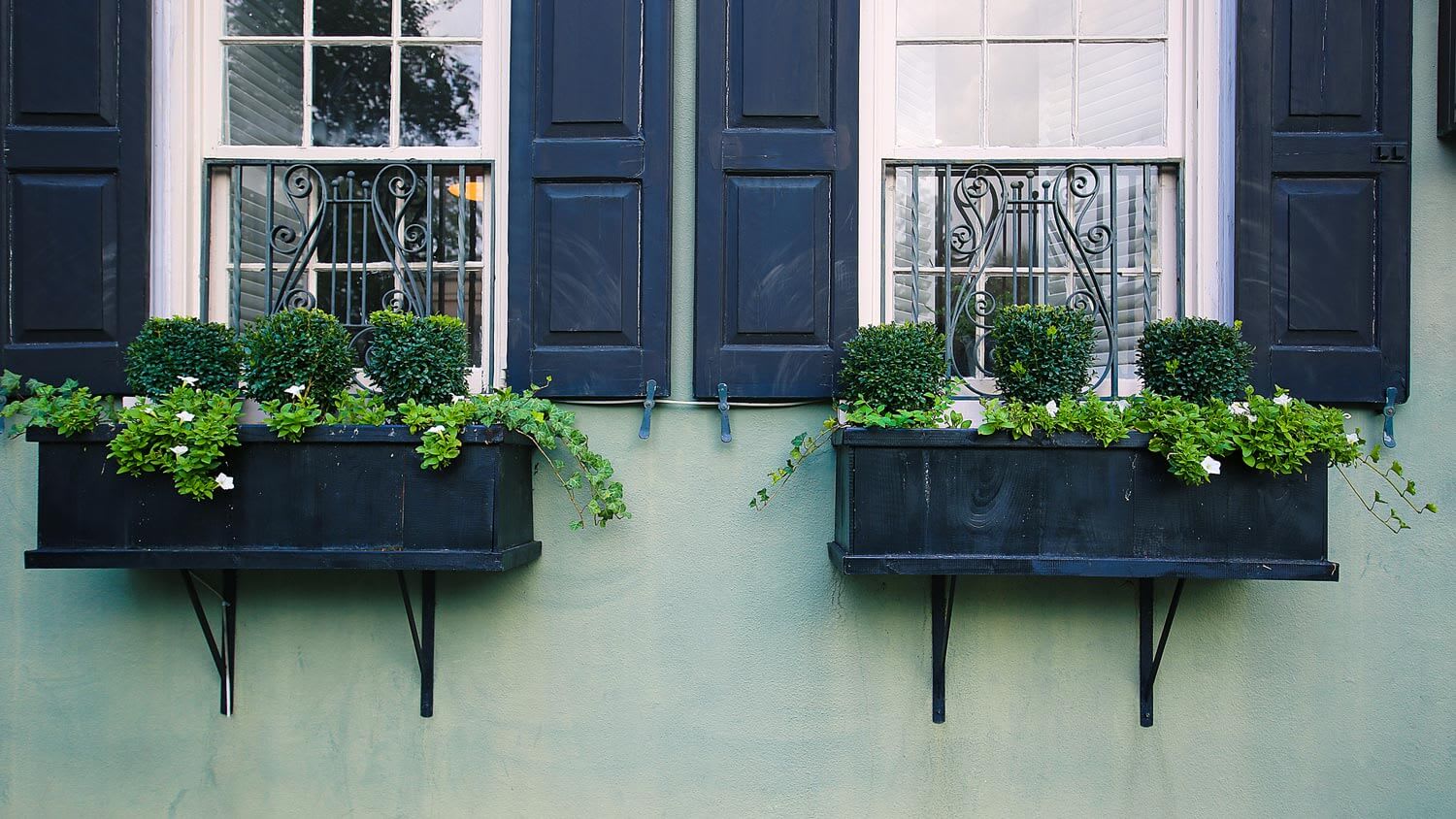 Detail of a green painted historic house