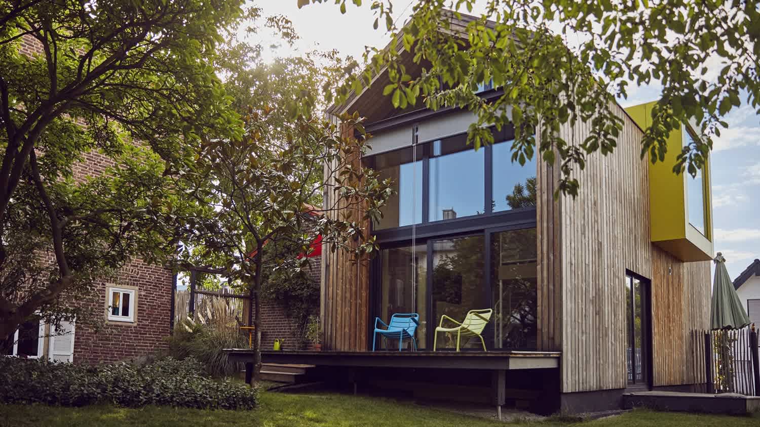 The exterior of a modern wooden house