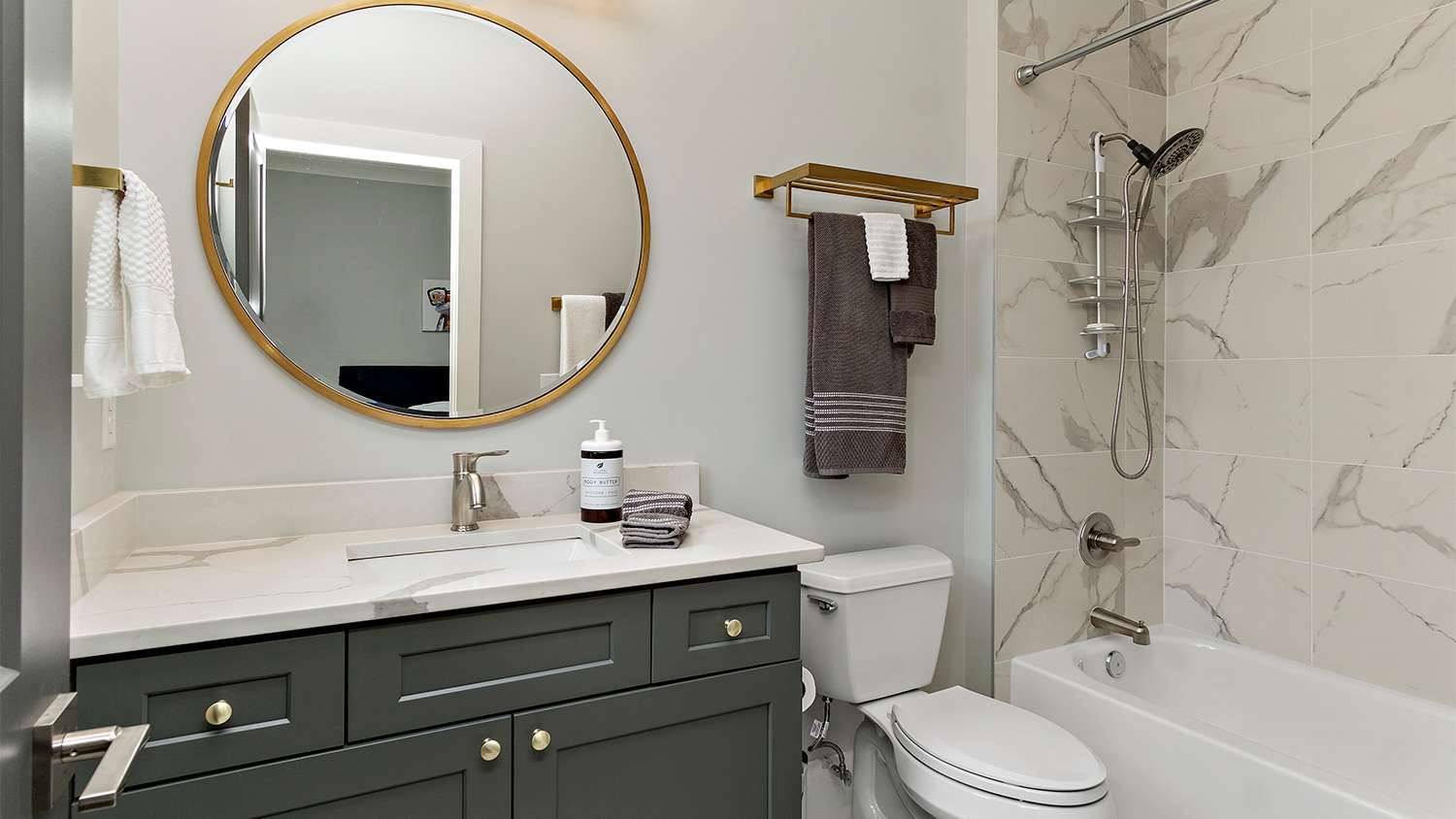modern gray and gold bathroom