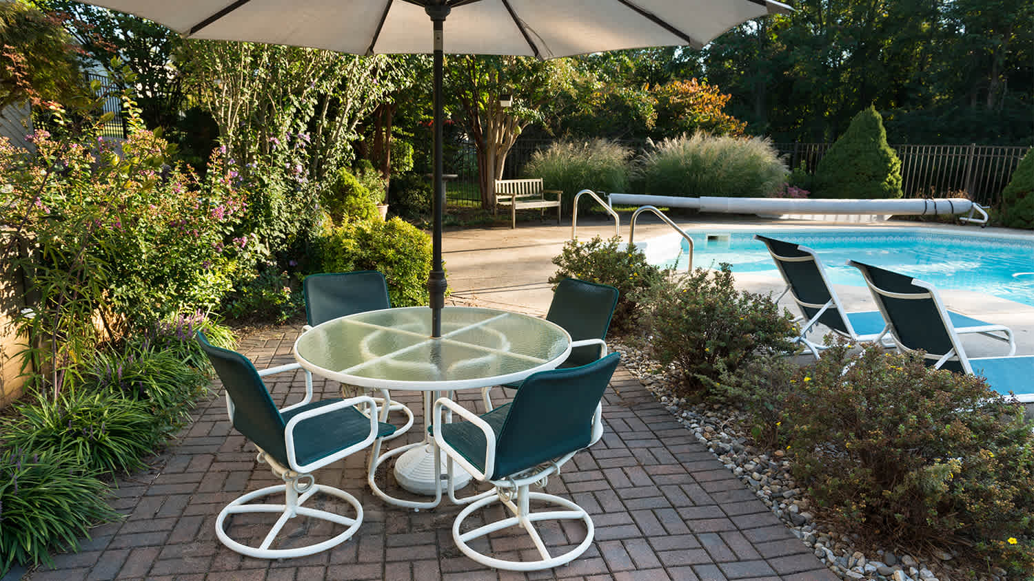 patio with pooland brick  basket weave paver
