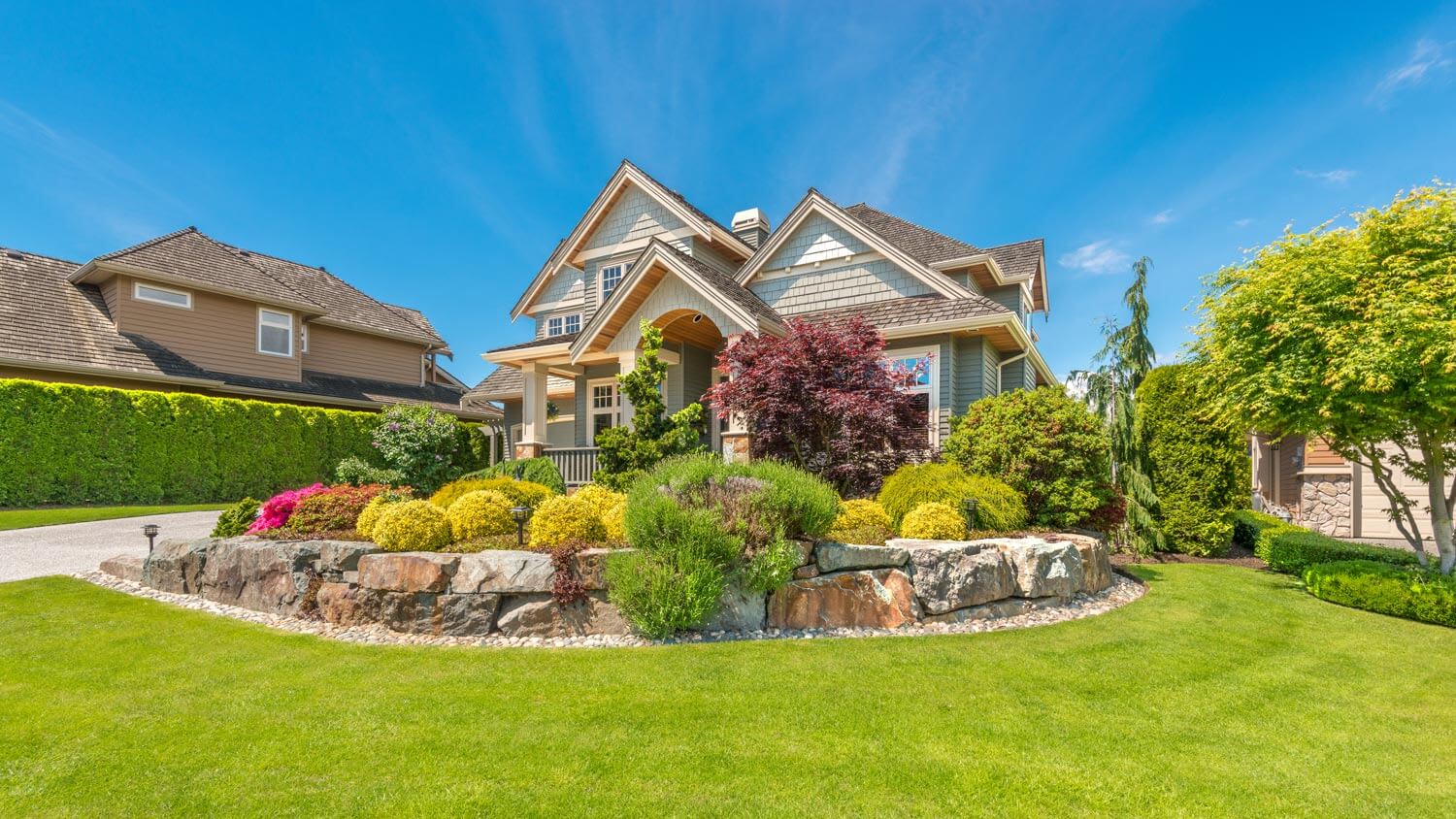 The exterior of a house with a landscaped garden