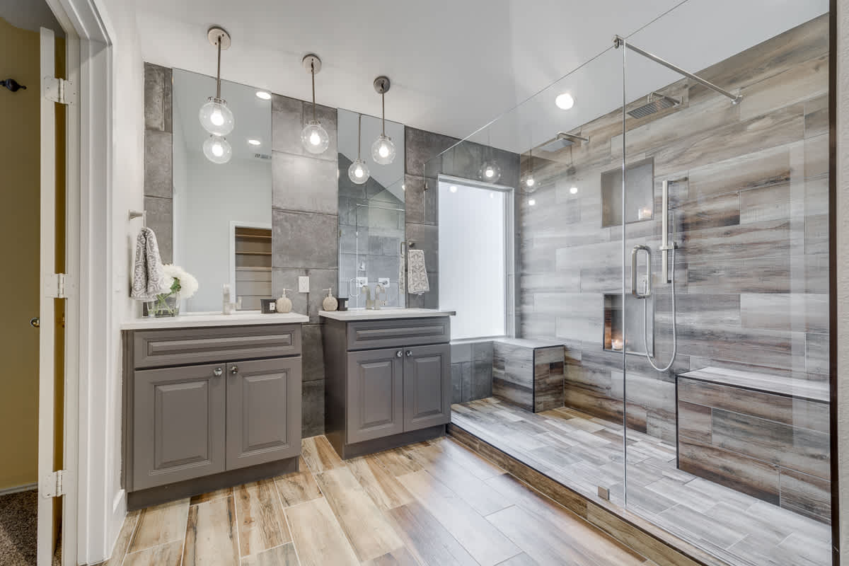 Gray bathroom with wood floors