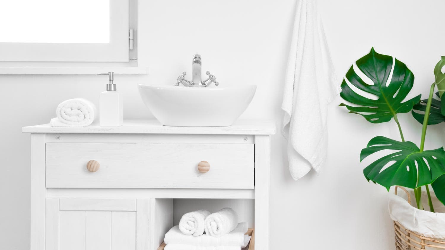 Simple bathroom cabinet with various supplies