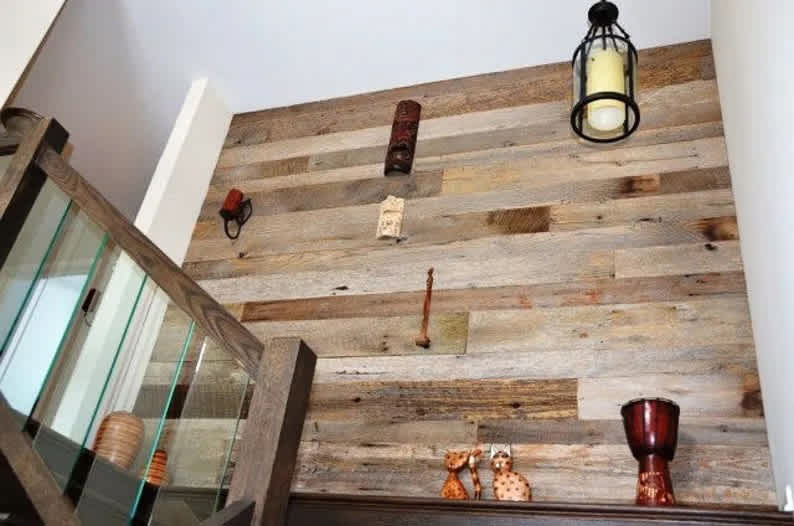 Home accent wall made with reclaimed barn wood
