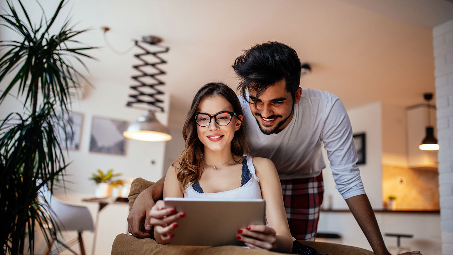 Couple looking at tablet