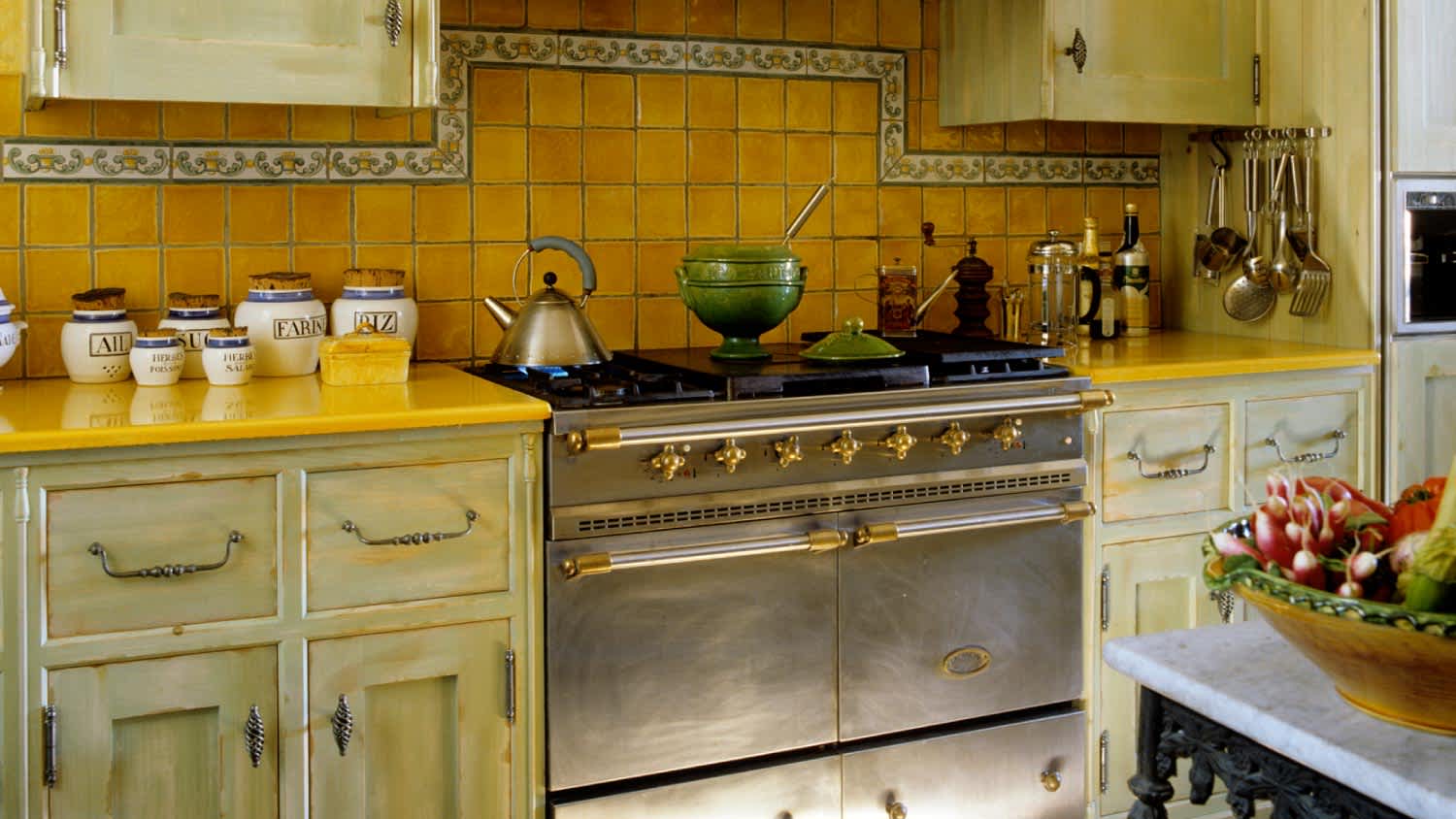 A french kitchen with yellow countertops