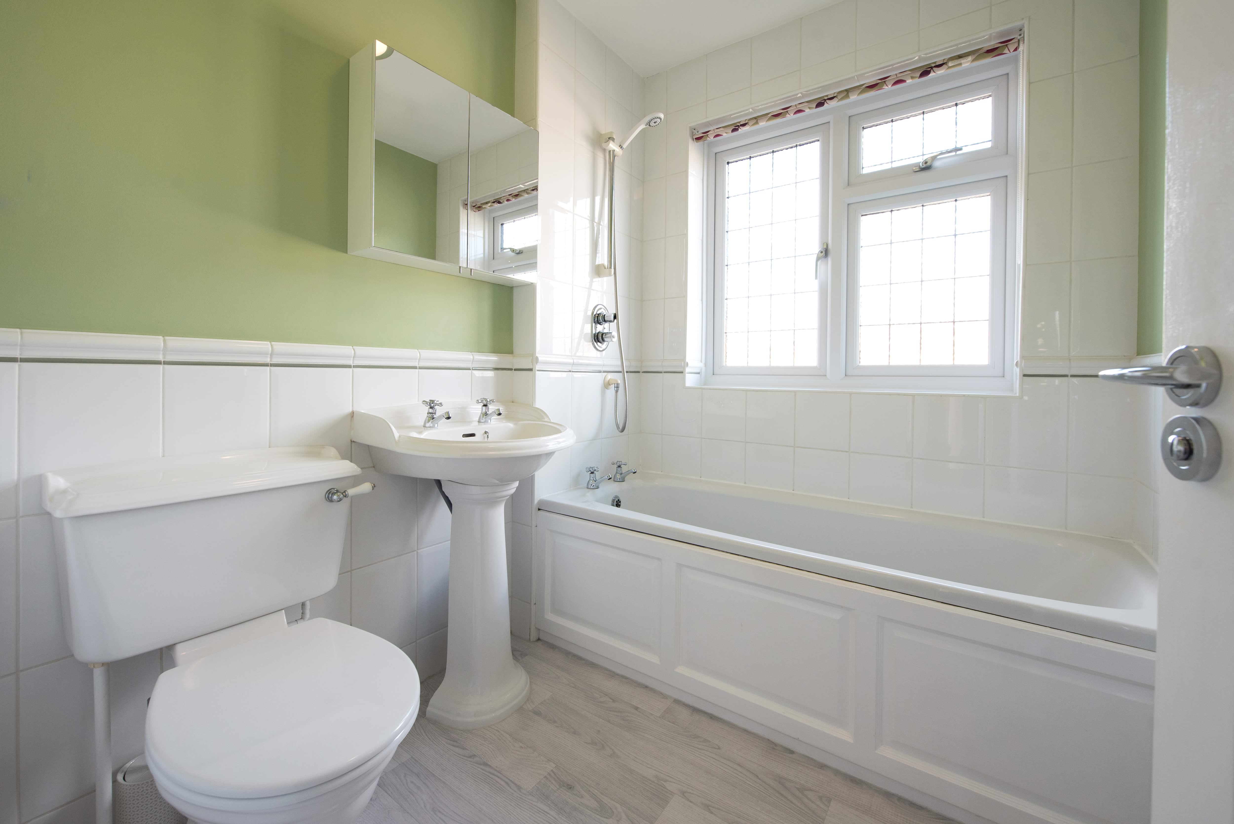 Modern bathroom with tile wall