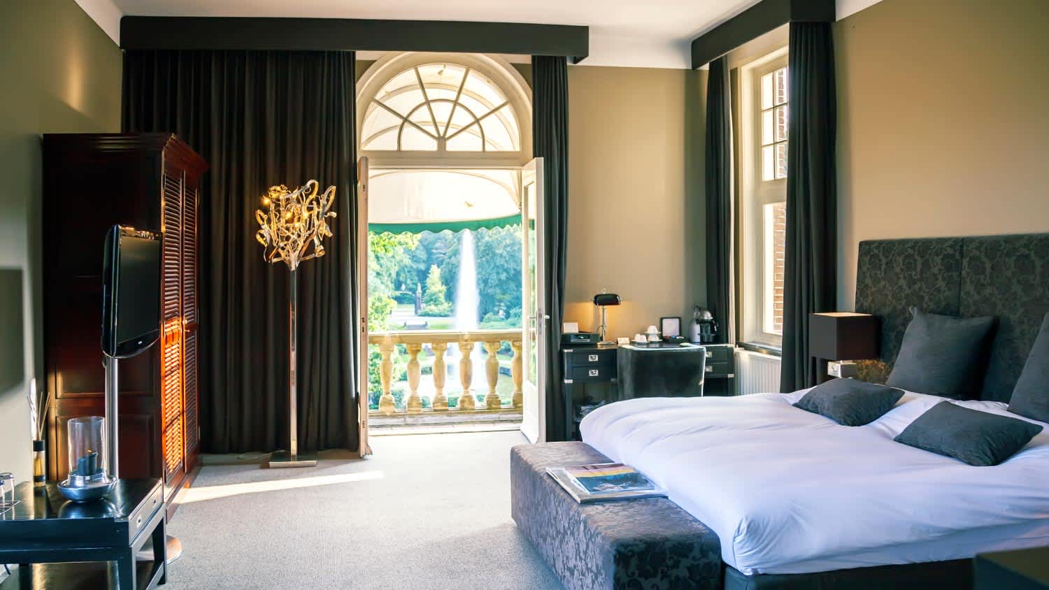 A luxury bedroom with blackout curtains