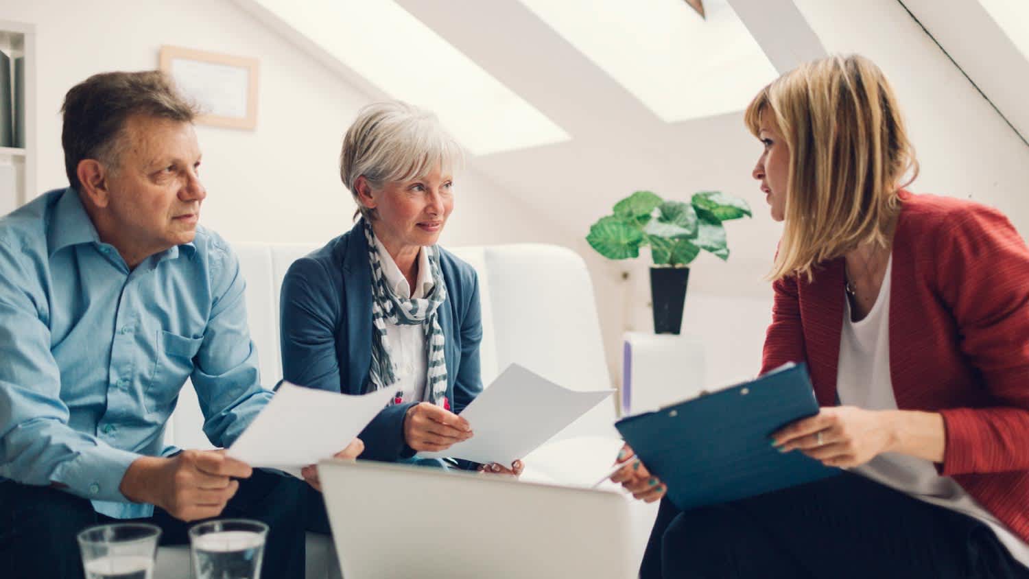 A couple in a meeting with a financial advisor