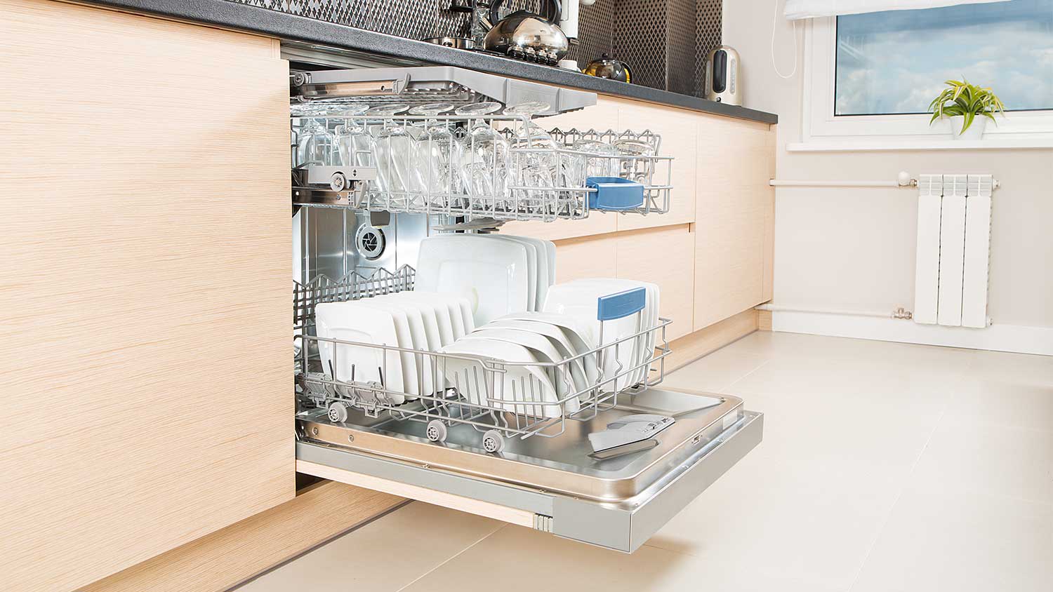 Fully loaded dishwasher after cleaning process